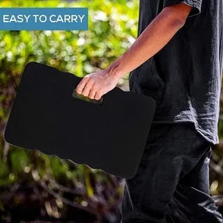 Blue EVA foam garden kneeler and seat cushion on grass, showing its size and thickness.