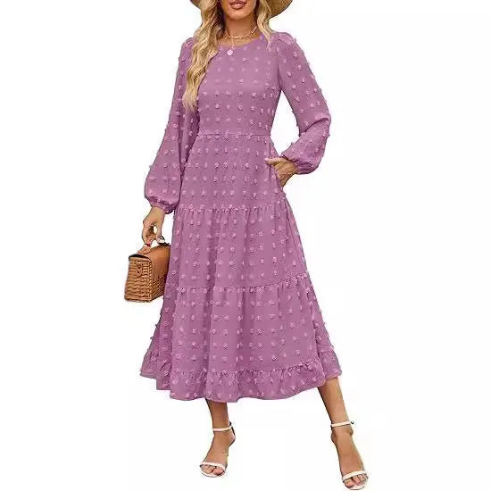 Women's long sleeve autumn dress with ruffle sleeves and high waist in a solid colour.