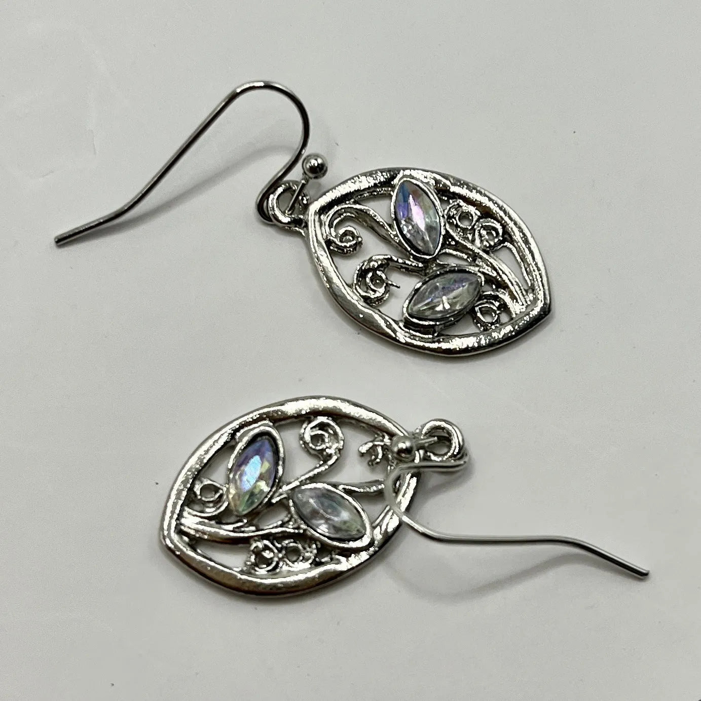 Silver leaf-shaped women's earrings with embedded colourful moonstones on alloy backing