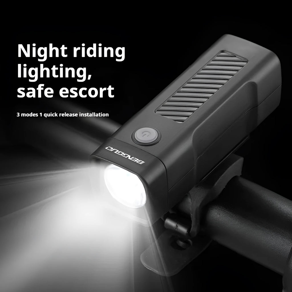 USB rechargeable bicycle headlight with quick-release strap bracket on handlebars.