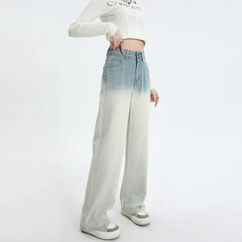 Women's gradient blue straight-leg denim trousers with wide leg design on hanger