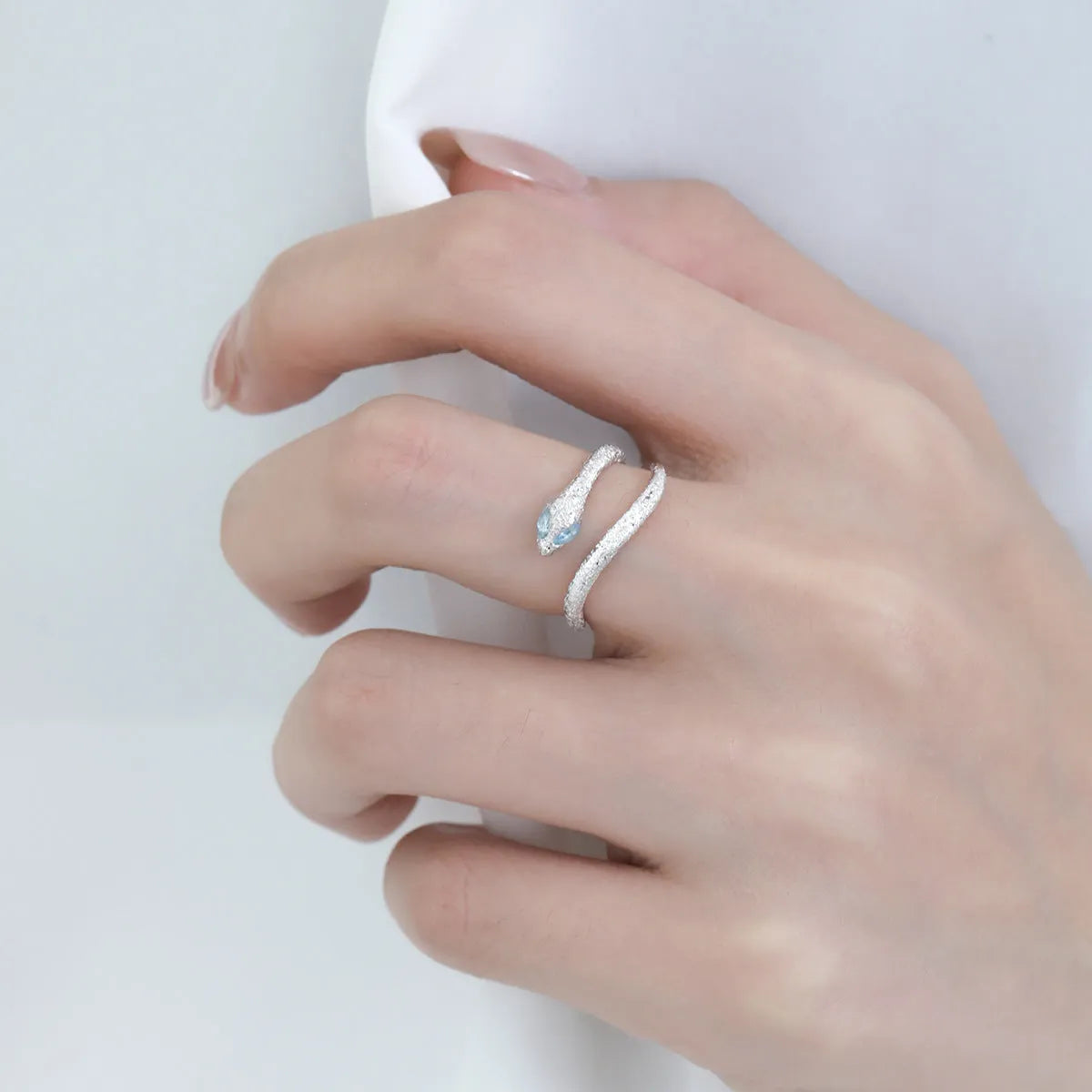 Women's adjustable silver ring with snake design in electroplated platinum colour
