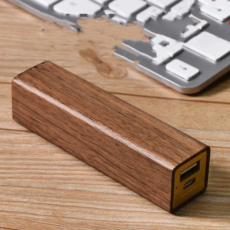 Brown walnut wood portable power bank with aluminium shell and charging port