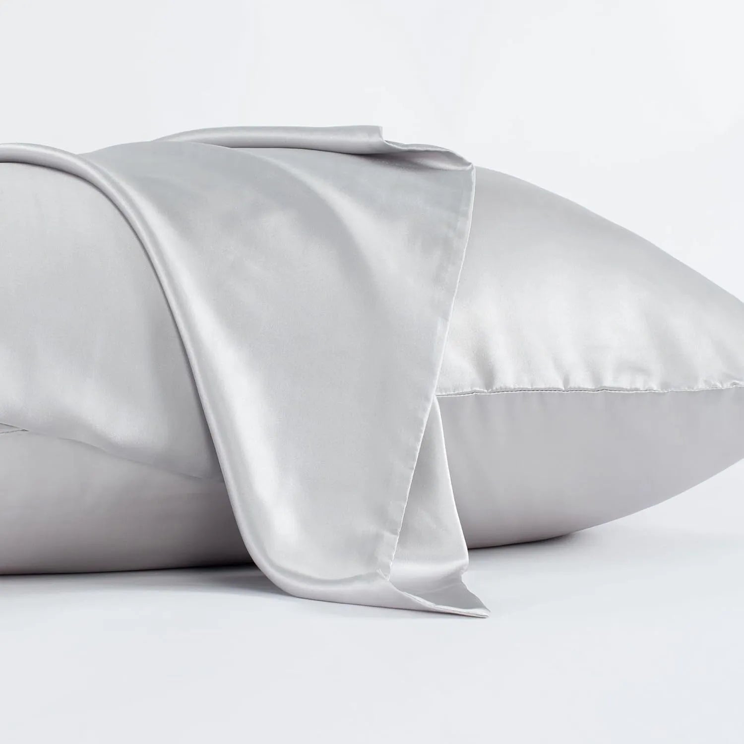 Dark grey envelope-style silk pillowcase laid flat, showing its size and solid colour.