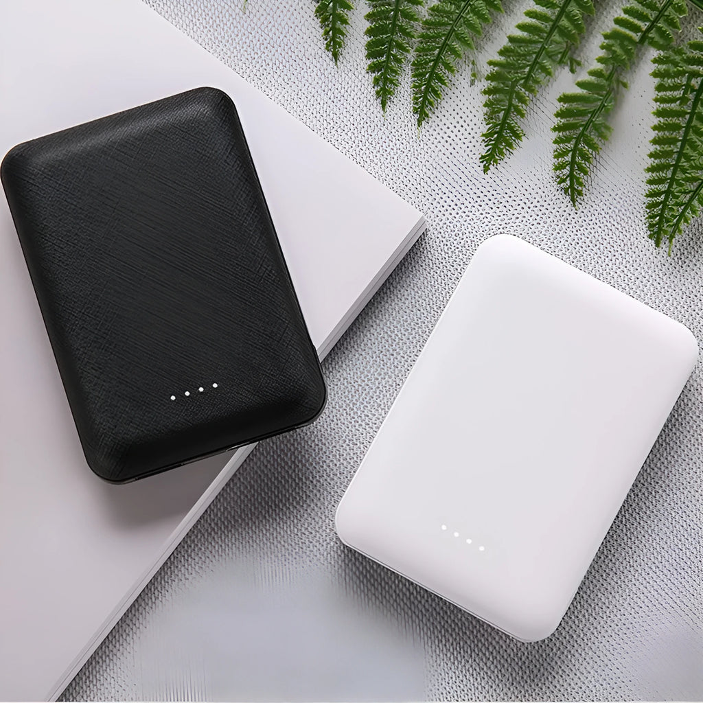 Ultra-thin 10000mAh power bank with multi-U port charging in black or white