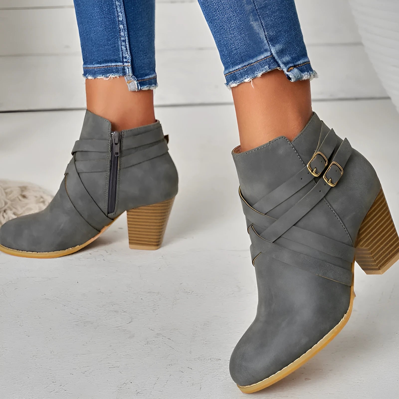 Plus-size grey ankle boot with side zip, chunky 7cm heel, buckle strap and rubber sole