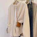 Women's beige viscose knit sweater coat with long sleeves and cardigan style