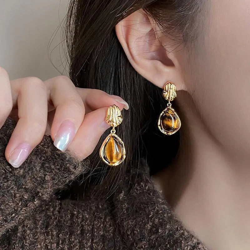 Handmade geometric earrings set with three styles including irregular, wafer and water drop shapes with tassel elements