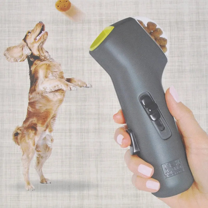 Grey pet snack catapult launcher with spring trigger for dogs and cats