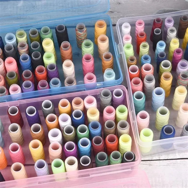 A 42-compartment transparent plastic sewing storage box for organising embroidery threads and needles.