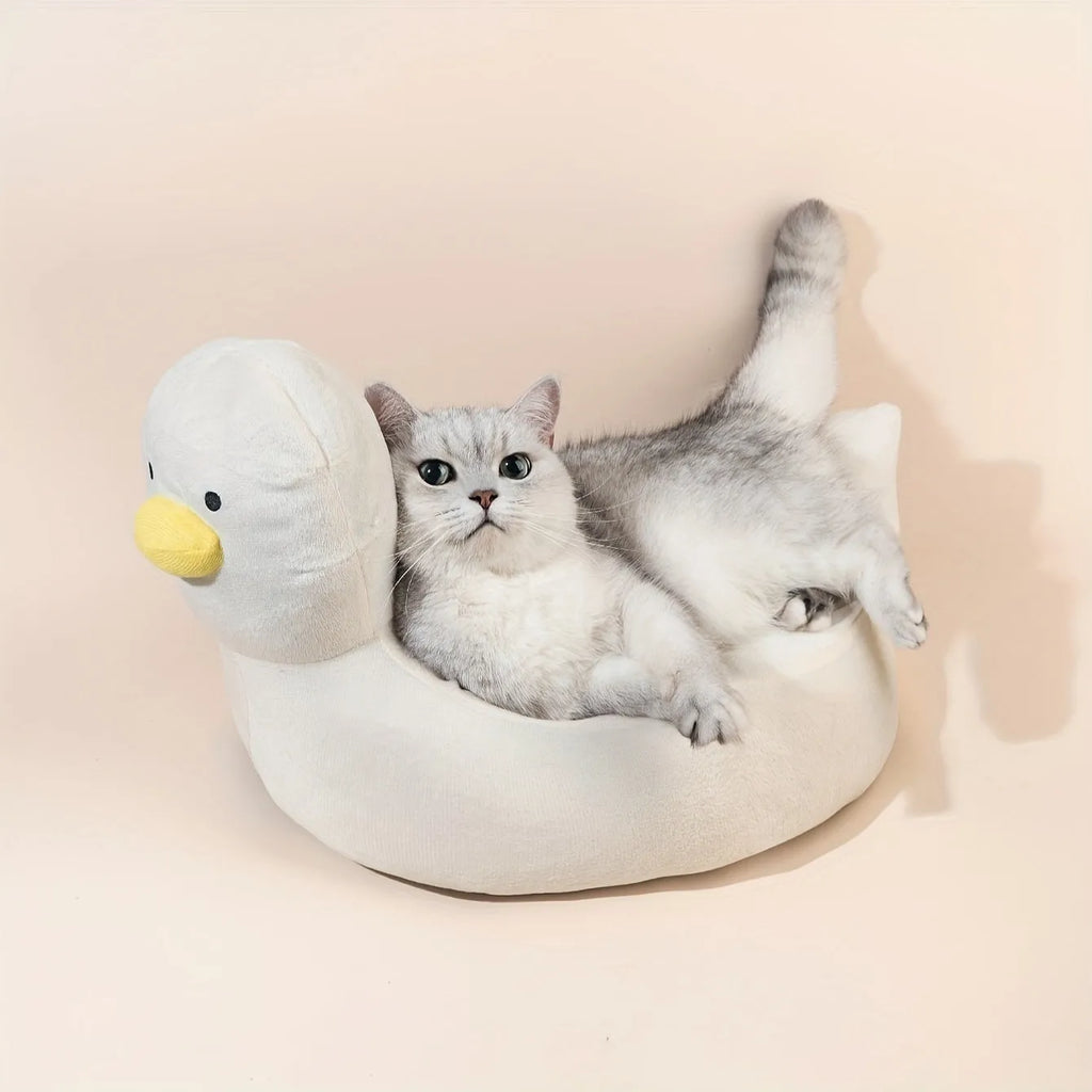 Blue duck-shaped fluffy pet bed sofa for small dogs and cats on floor