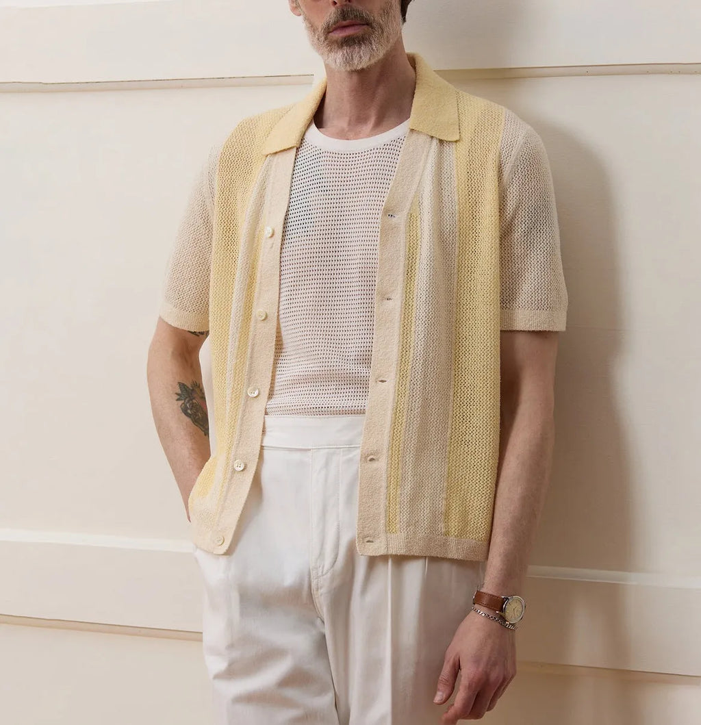 Yellow casual polo shirt with hollow-out pattern and asymmetric design detail, short sleeves