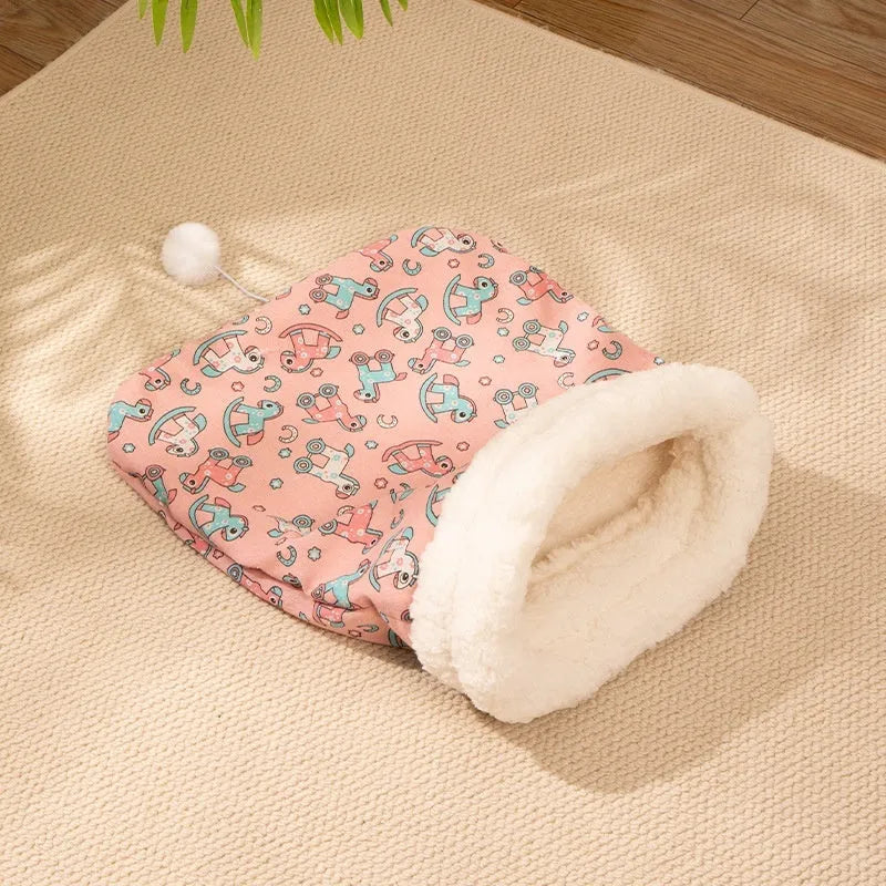 Flannel cat sleeping bag nest bed in pink trojan design, 50 by 40 cm.