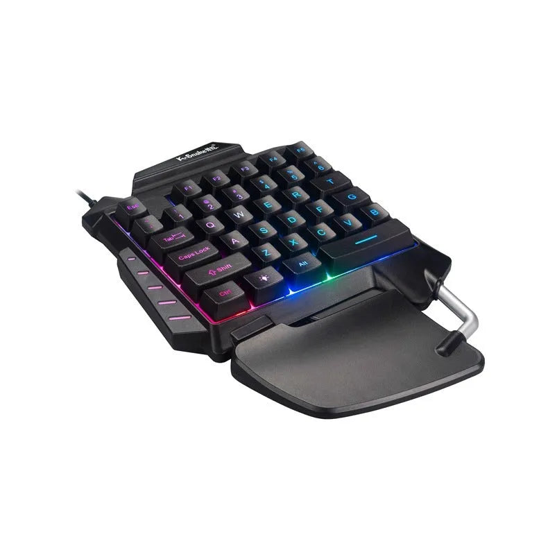 Black one-handed gaming keyboard with integrated left joystick and palm rest