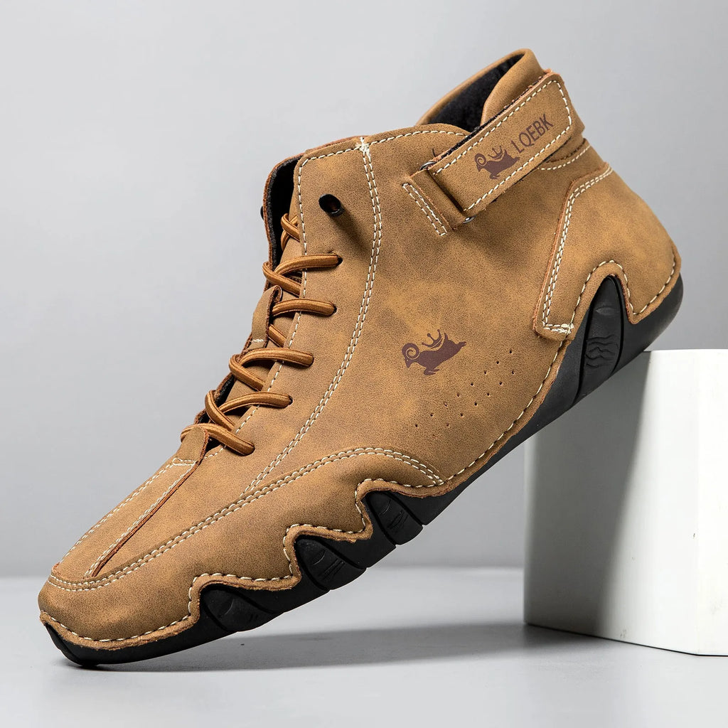 Men's brown high-top casual Martin boots with round toe and flat rubber sole on a white background.