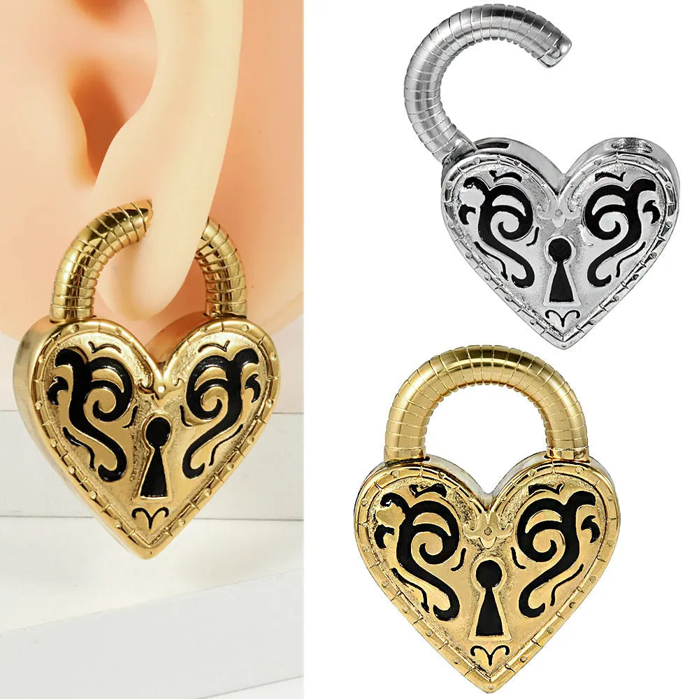 A single heart-shaped earring in stainless steel with a choice of gold or steel electroplated colour.