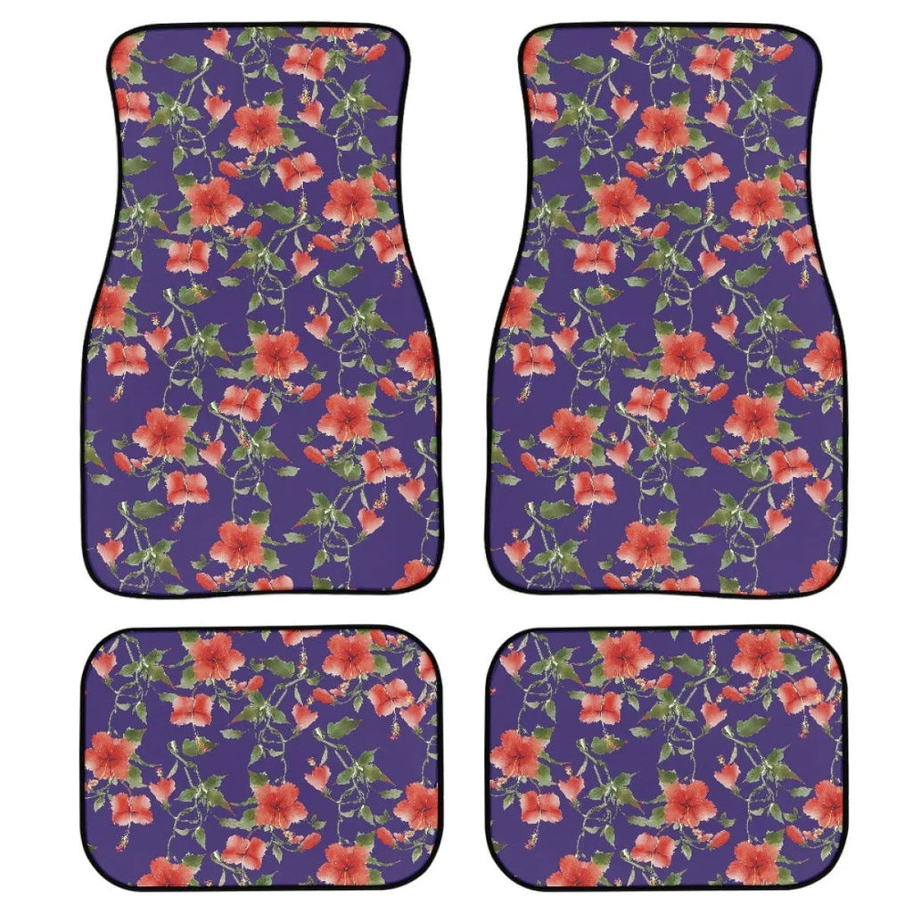 Black four-piece rubber car foot mat set with a textured surface.