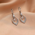 Women's copper water drop tassel earrings with a choice of gold or silver thickened buckles.