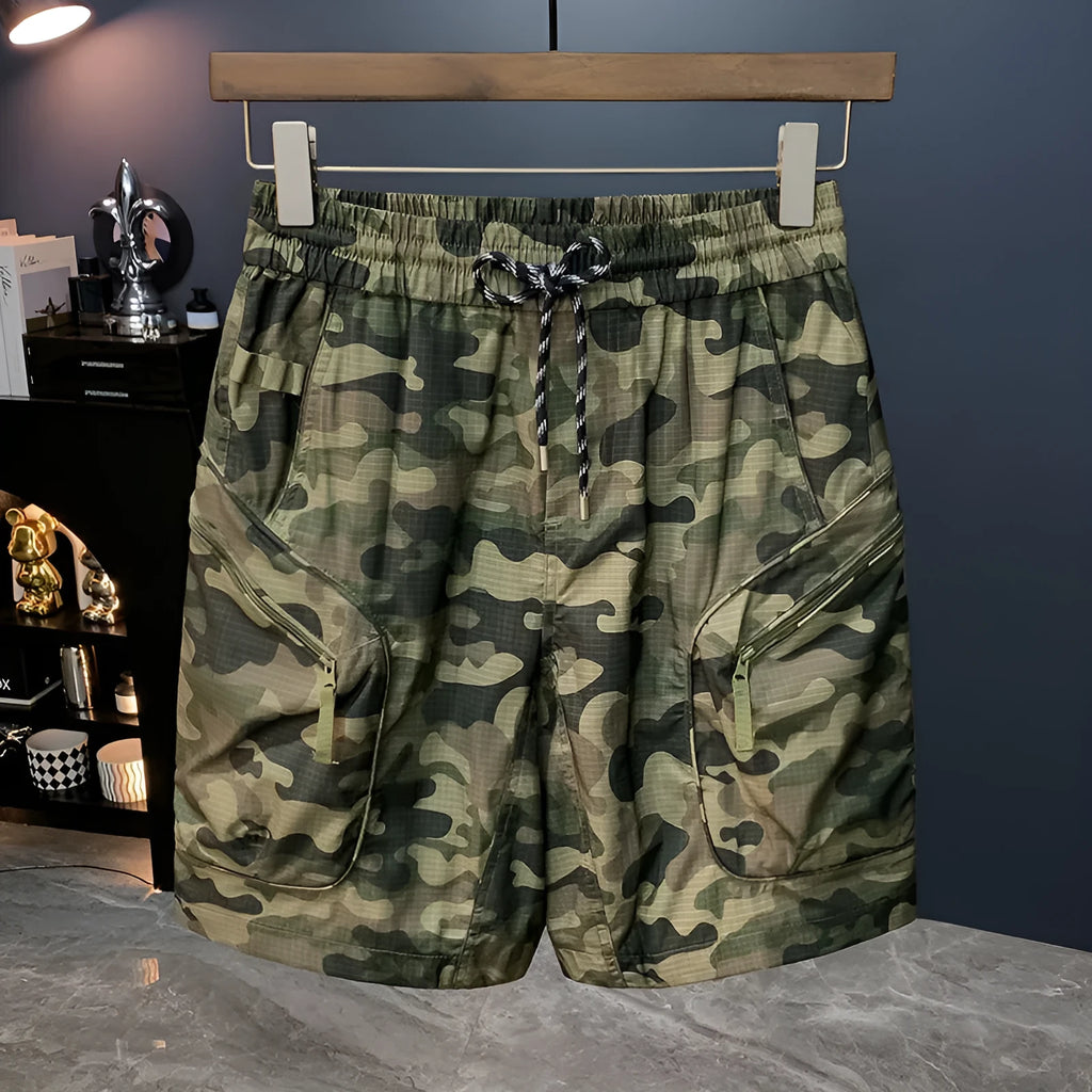 Men's camouflage cargo shorts with cargo pockets and loose fit design