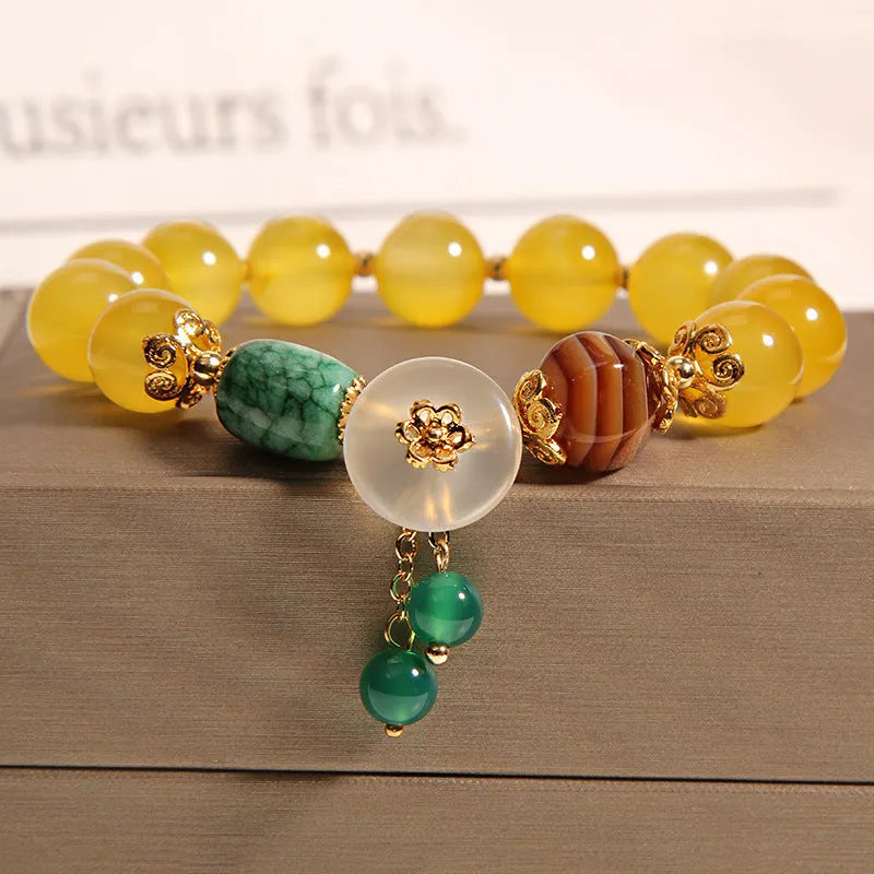 Yellow agate crystal and gold silk women's bracelet in khaki colour.