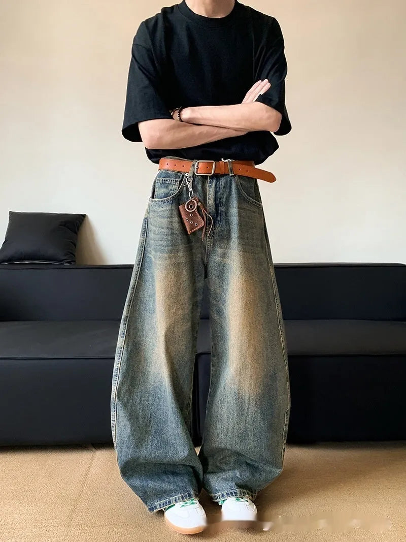 Men's retro blue distressed denim pants with wide leg cut and micro elasticity fabric