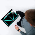 Black football training mat measuring 60 by 90 centimetres for non-slip practice