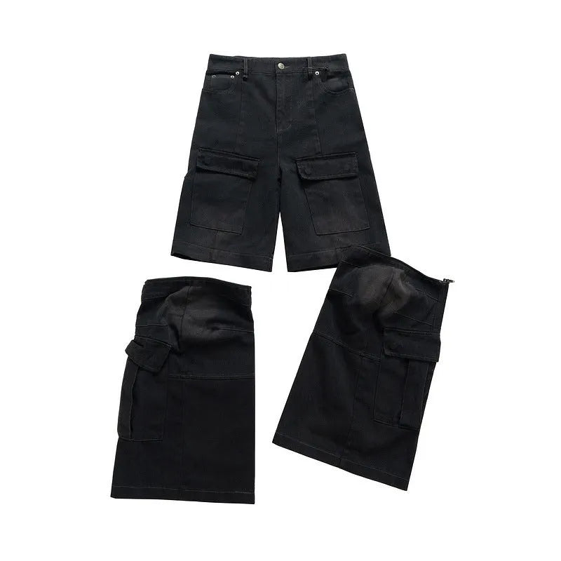 Black cotton overalls with detachable multi-pocket design and two-way zip.