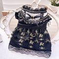 Golden Gothic princess style skirt costume for a small dog or cat on a mannequin.
