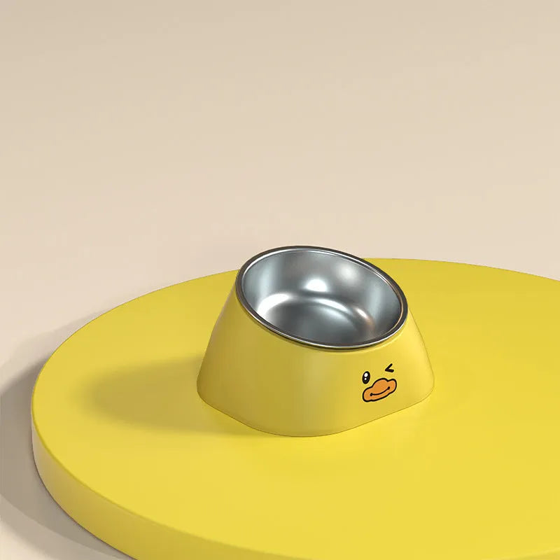 Green tilted stainless steel cat bowl with non-slip white base at a 15 degree angle