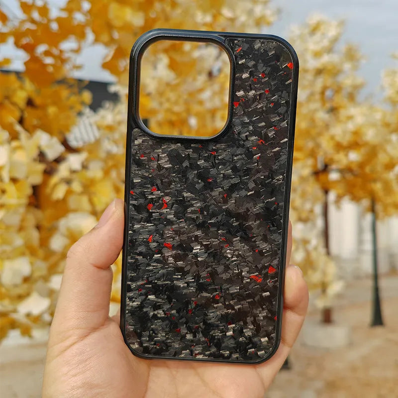Carbon fibre iPhone case with gold foil forged grain finish, magnetic suction, and all-inclusive shockproof design.