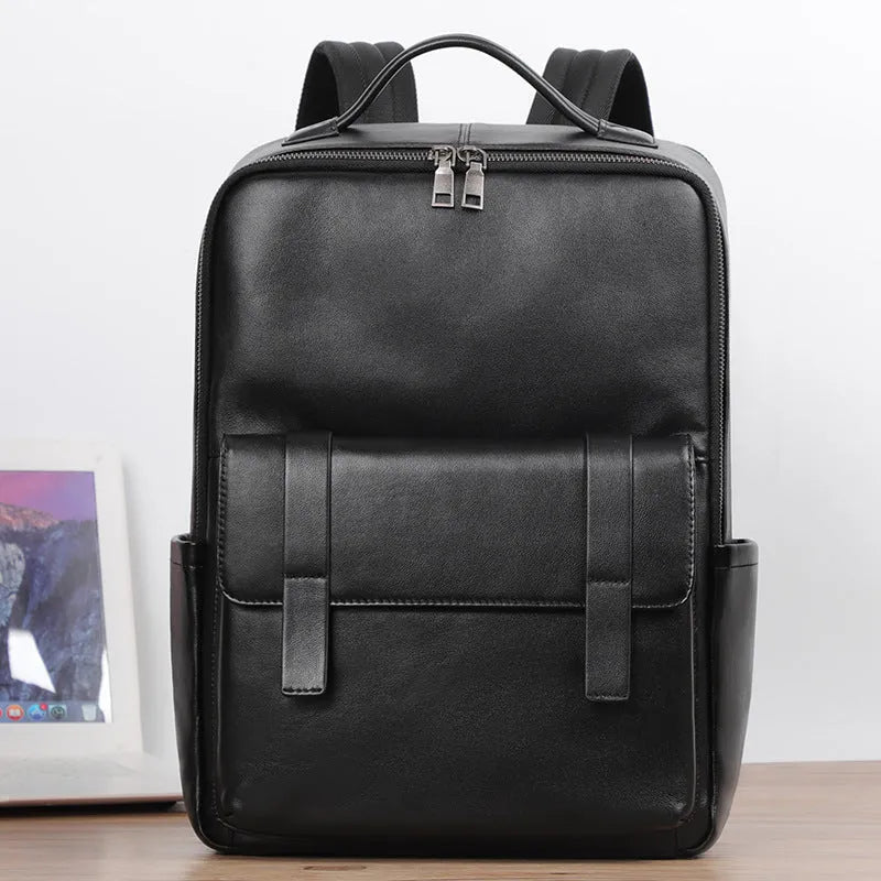 Men's black genuine leather computer backpack with weaving detail and large 36-55L capacity.
