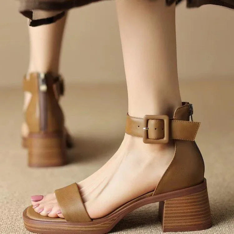 Women's white ankle-strap platform heels with round toe design