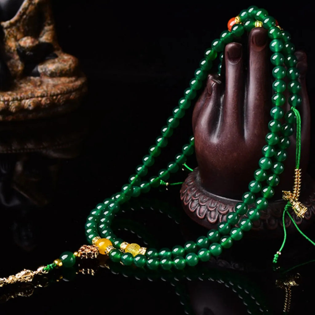 Natural green agate multi-circle bracelet for men and women on a wrist, showing bead detail.
