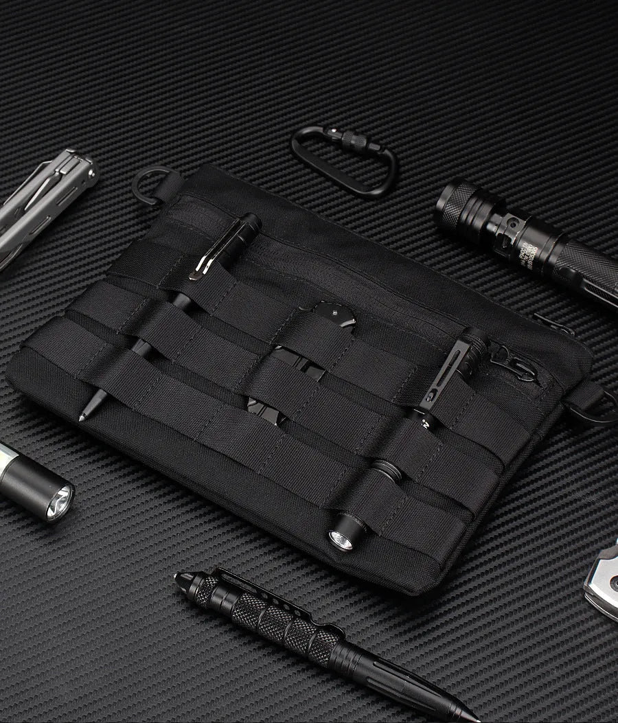 Solid black Oxford cloth portable organiser bag measuring 18cm by 3.5cm.