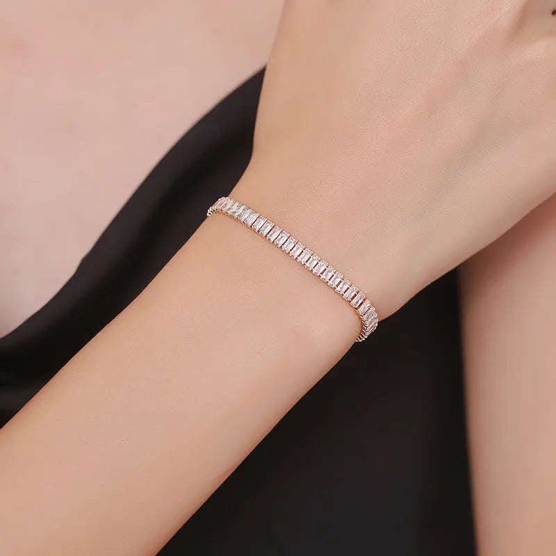Geometric rectangular brass bracelet with zircon inlays in champagne gold or silver colour