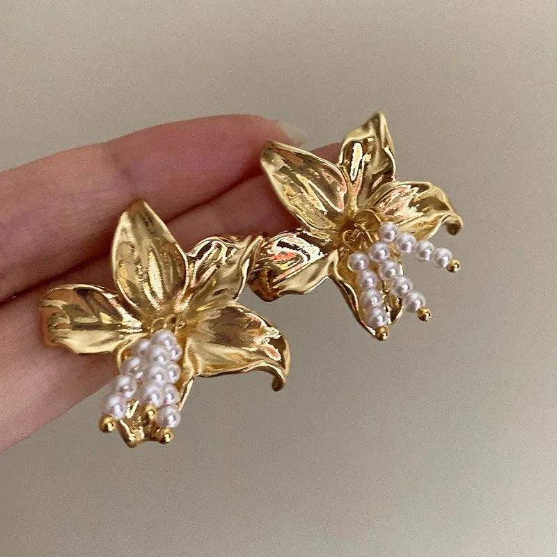Gold H1795 personalised pearl flower earrings with exaggerated design and Seiko treatment