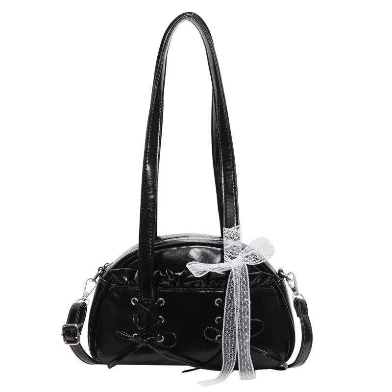 Women's bandage bow handbag in milky white colour with adjustable bow detail and internal mobile phone compartment