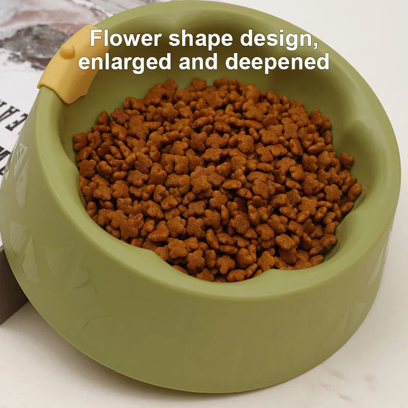 Green flower-shaped plastic pet bowl for cat or small dog food and water.
