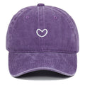 Retro style cotton baseball cap with embroidered detail on the front, shown in an adjustable size.