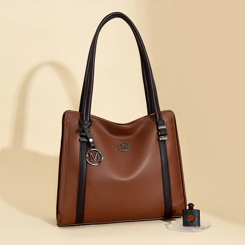 Women's retro style large black PU crossbody bag with double shoulder strap shown open.