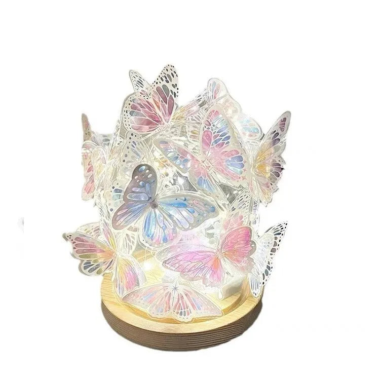 Handmade butterfly-shaped DIY night lamp with glass shade and raw wood base, 12cm by 15cm.