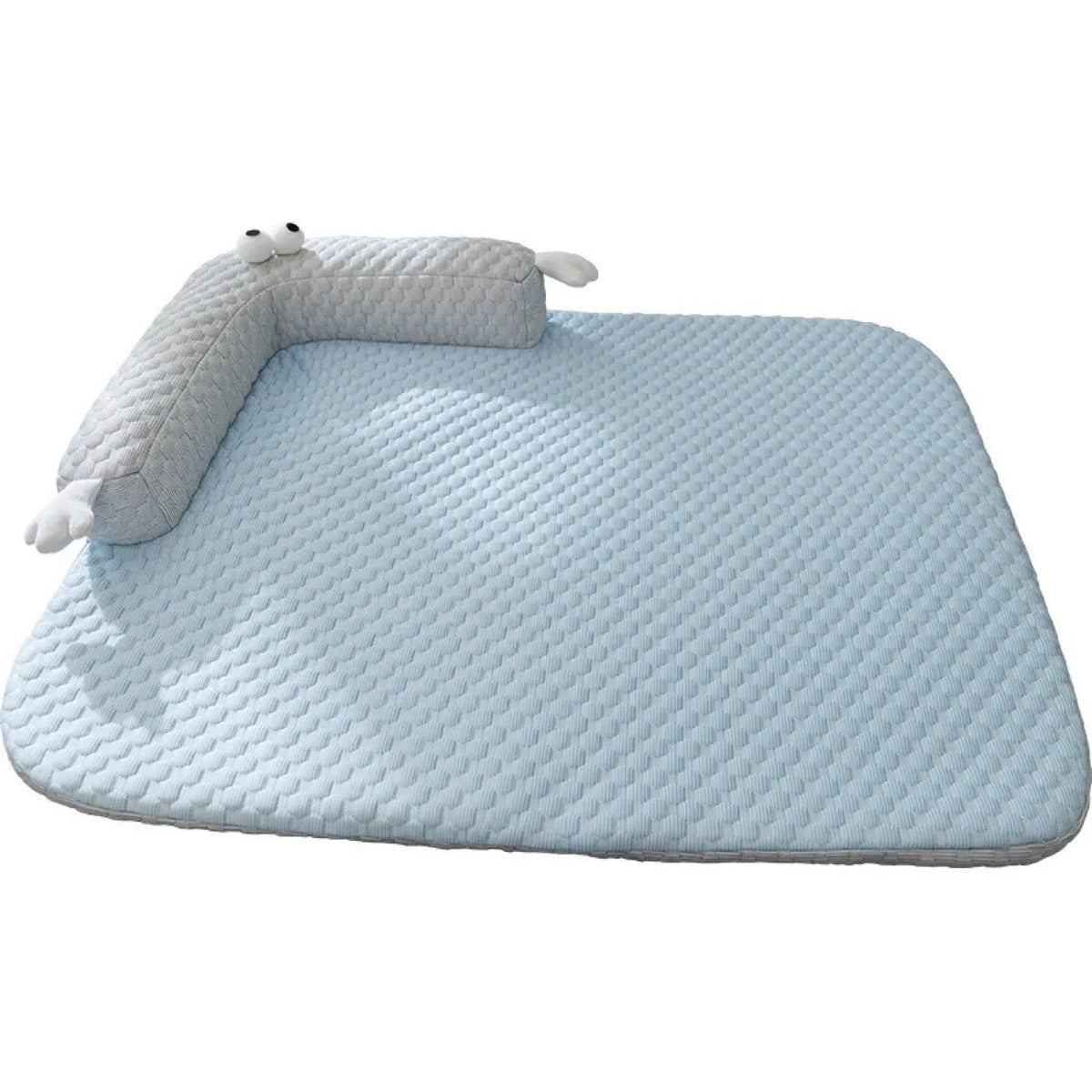 Blue and yellow pet bed cushion with big-eyed monster design on a non-slip base for dogs and cats.
