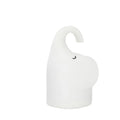 DOMI Elephant-shaped silicone night light with warm white LED glow on a bedside table.