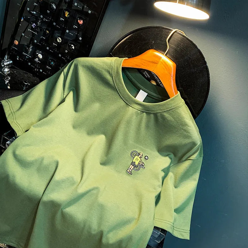 Green men's loose fit t-shirt with literary print design and short sleeves