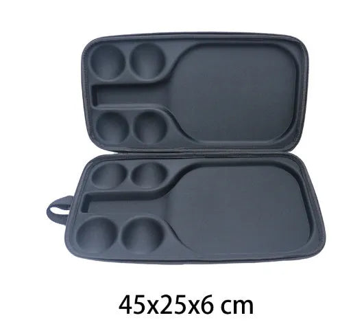 Black EVA pickleball storage bag with double shoulder straps, shown with a paddle and balls.