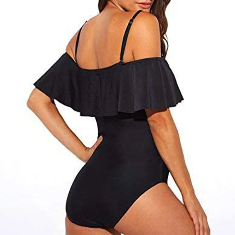 Black one-piece swimsuit with ruffled strap tube top design and solid color pattern for swimming