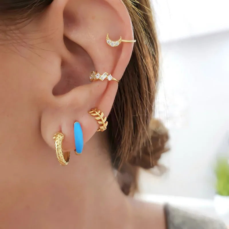 Geometric U-shaped epoxy oval curved earrings in copper with dripping oil finish