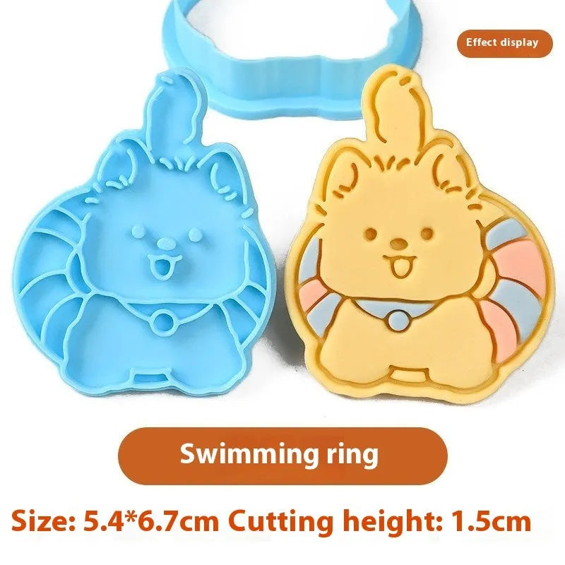 Plastic three dimensional biscuit mold with cartoon puppy designs including birthday hat style