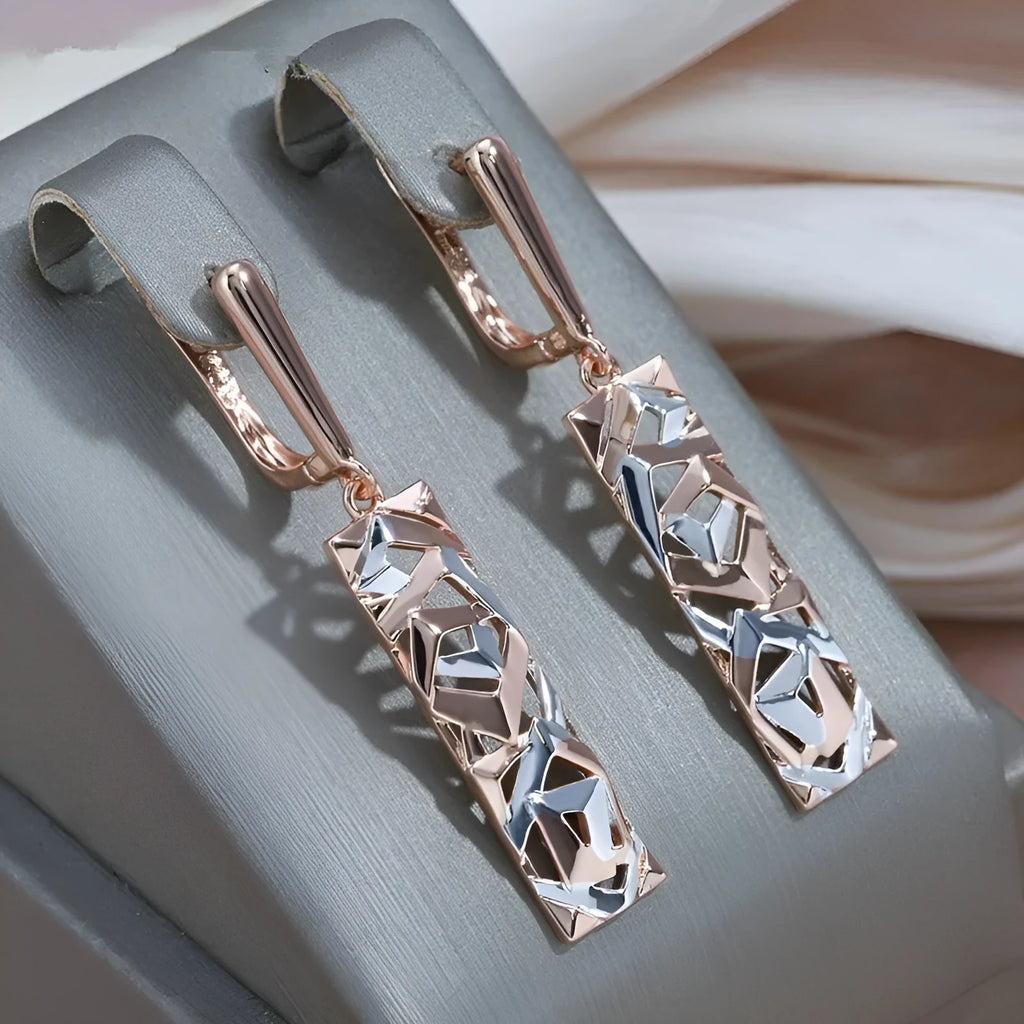 Rectangular hollow stud earrings with two-tone electroplated finish and geometric design