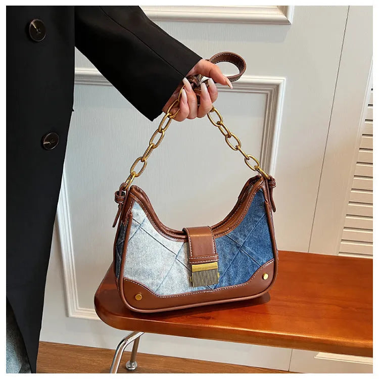 Brown denim women's bucket shoulder bag with diamond mesh chain straps and lock closure